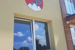 Znak obce na stěně od Dave Art